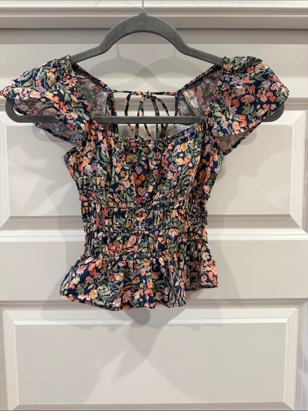 Altar'd State Navy Floral Off-Shoulder Smocked Peplum Top